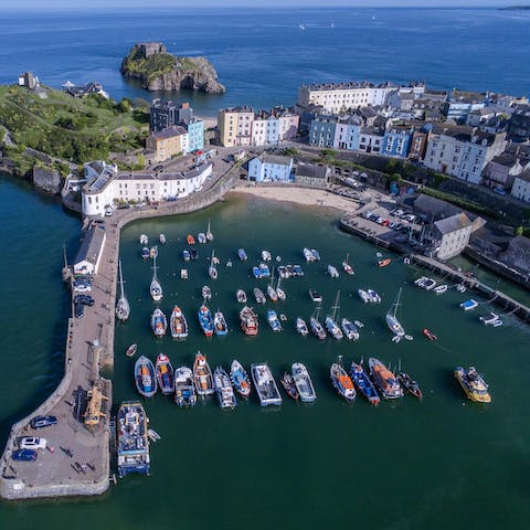 Visit the colourful Tenby harbour, minutes away on foot