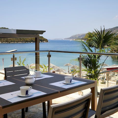 Enjoy a delicious breakfast with a sea view each morning