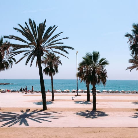 Feel the sand beneath your toes at La Barceloneta – a seventeen minute drive