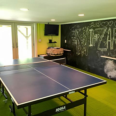 Keep the kids entertained in the recreation room with its ping pong table