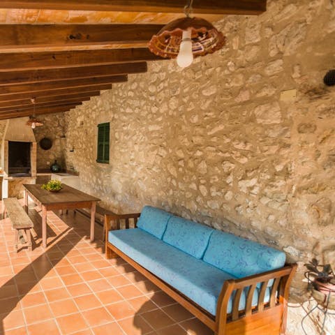 Chill out on the covered terrace after a day on one of Pollença's fabulous beaches