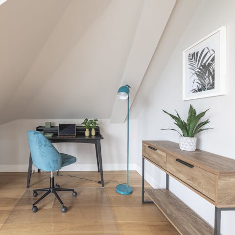 Catch up on work from the handy desk in this comfortable apartment