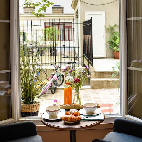Feel like a true Parisian and enjoy breakfast in the picturesque window