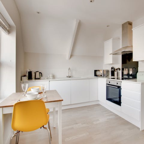 Start mornings with a bite to eat in the bright kitchen before setting off for the beach