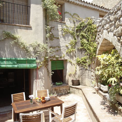 Crack open a bottle of Penedes wine and enjoy in the sunny courtyard