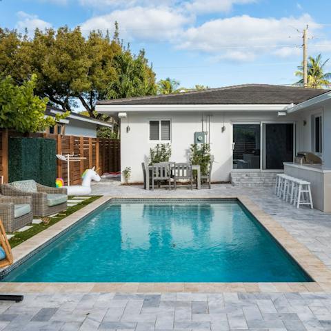 Soak up the Florida sunshine from the private pool and terrace area