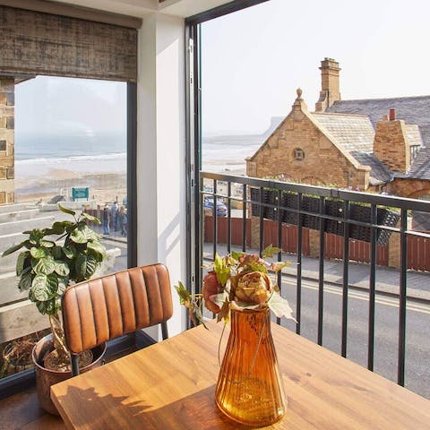 Open the bi-fold doors and enjoy your morning coffee with a side of sea views