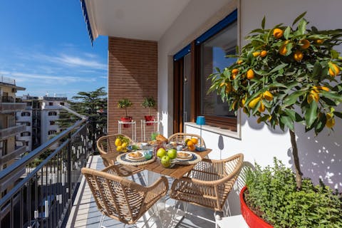 Enjoy breakfast on the balcony as the sun warms your skin