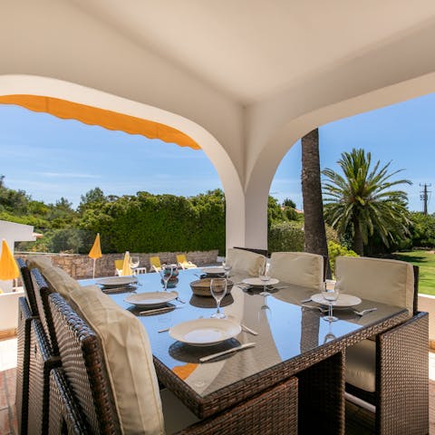 Light the barbecue and dine alfresco with views across your garden
