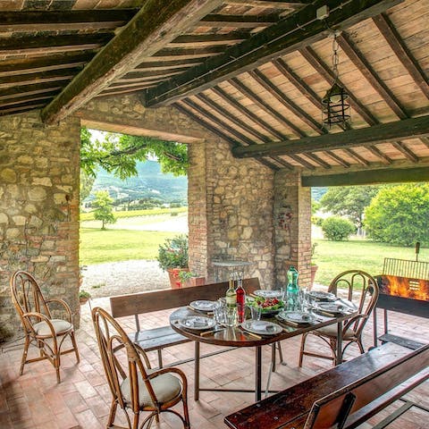 Light the fire and enjoy dinner with wine in the enclosed terrace