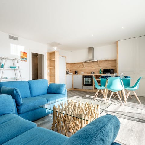 Prepare meals while socialising in the stylish open-plan living space