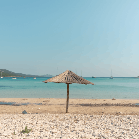 Let the sea wash over your feet at Kalkan beach, a short drive away