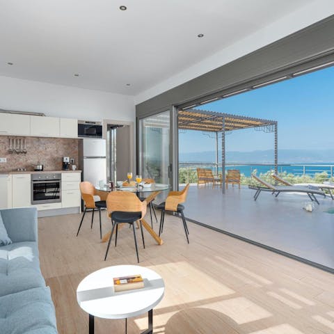 Admire beautiful sea views from the open-plan living area