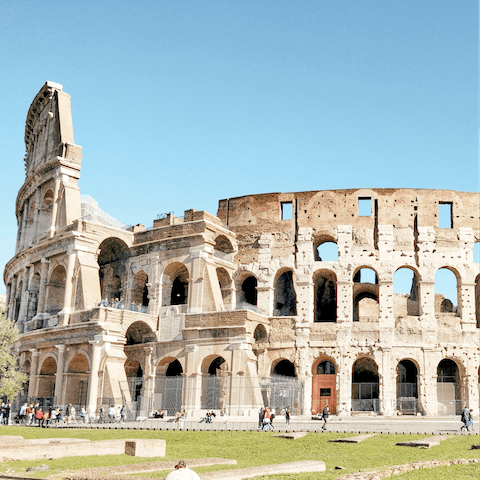 Visit the awe-inspiring Colosseum, which can be reached in a scenic thirty-minute walk from home