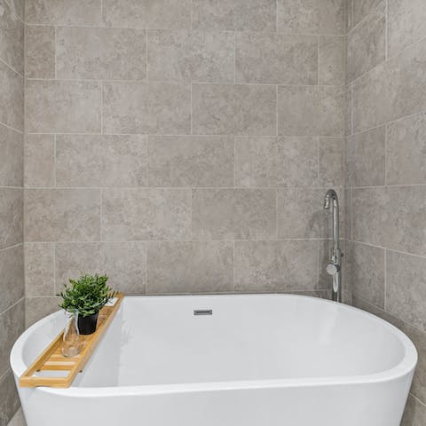 Enjoy a soak in the freestanding bathtub