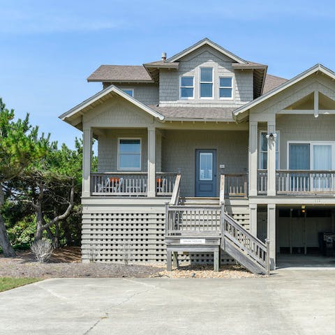 Admire the stunning sunset over Currituck Sound from your porch