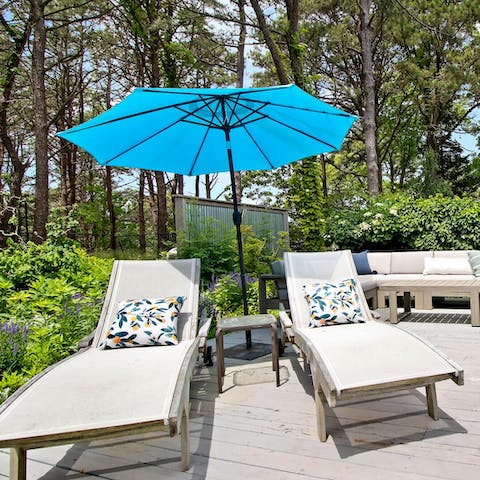 Soak up some Hamptons sunshine from the garden lounge