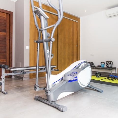 Start the day with a sweaty workout in the home's gym