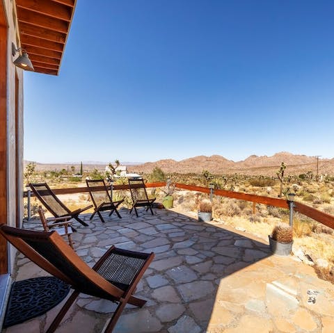 Enjoy morning coffee with a view from the stone terrace