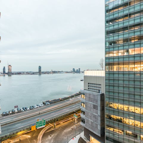 Admire the views of East River from your private balcony