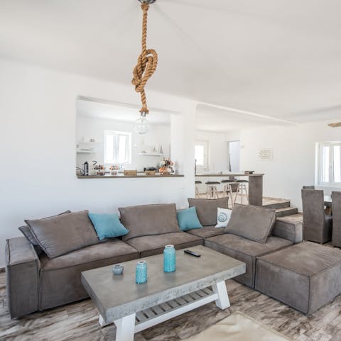 Cool off with a cold drink in the beach-inspired living area 
