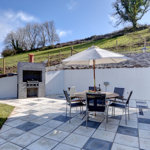 Fire up the the barbecue for an alfresco feast in your private sunny patio