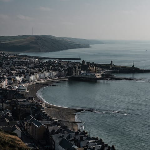 Spend an afternoon exploring Aberystwyth, a twelve-minute drive away
