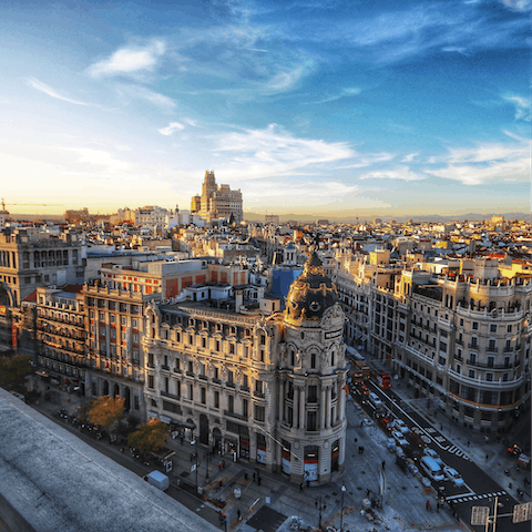 Explore Madrid and its historical sites, grand monuments, and top eateries