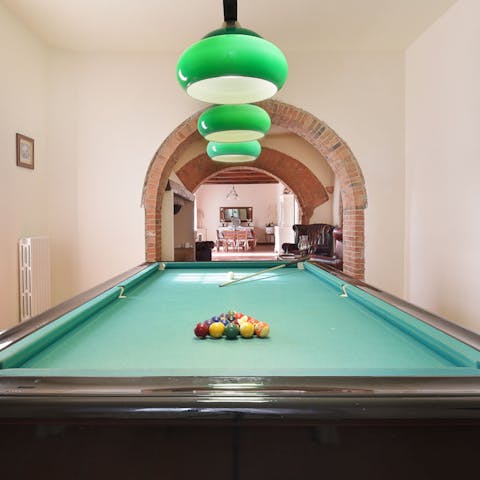 Challenge a friend to a game of billiards