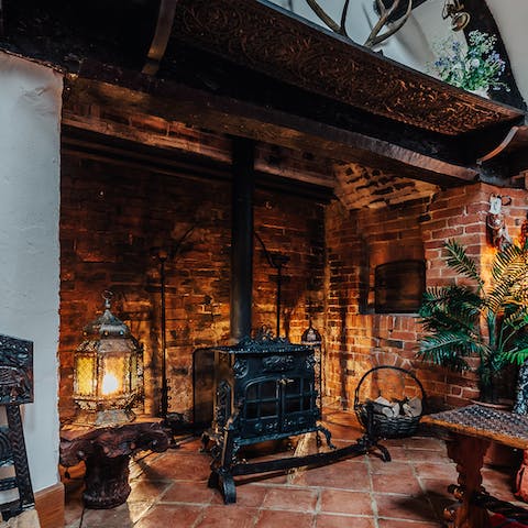 Cosy up around the log-burning stove with a good book