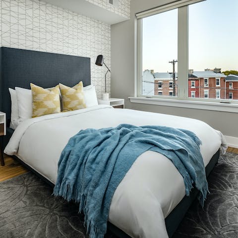 Wake up to Fishtown views in the stylish master bedroom