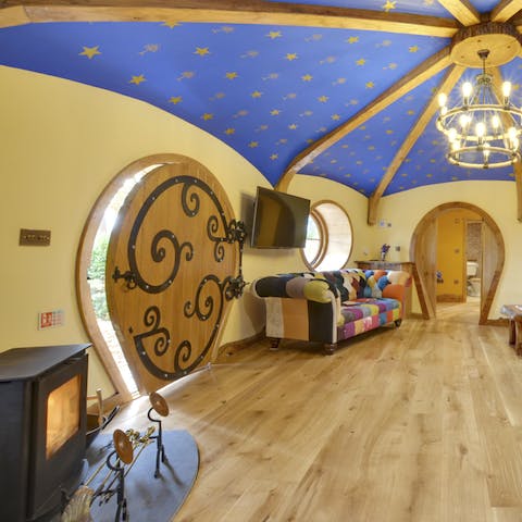 Admire the round windows and doors and oak flooring