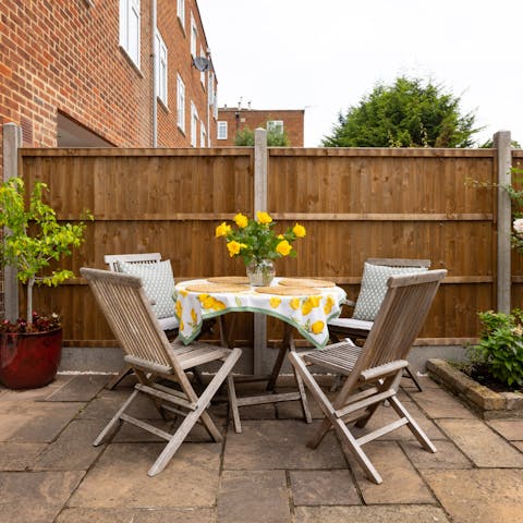 Enjoy a glass of English wine in the enclosed garden