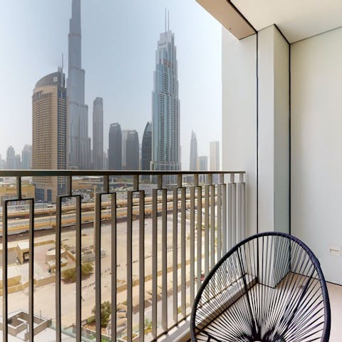 Gaze up at the towering Burj Khalifa from the balcony