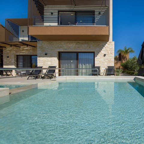Enjoy a soak in the pool or in one of the two hot tubs