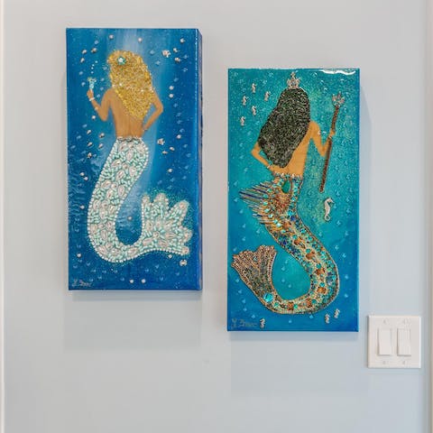 Feel at peace amongst the stylish mermaid and ocean-themed decor