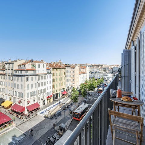 Take your morning espresso out to the private balcony and enjoy sweeping city views