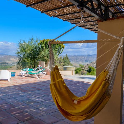 Enjoy a siesta out on one of the hammocks