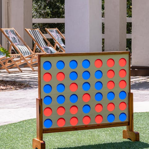 Play Connect-Four on the lawn before firing up the barbecue ahead of dinner