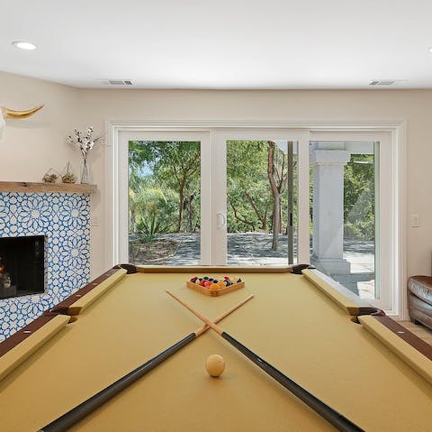 Challenge a guest to a game of pool on the colour-coordinated table
