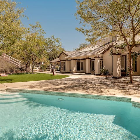 Cool off from the SoCal sunshine in the home's swimming pool