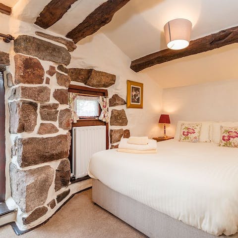Admire the period beams and traditional stone walls