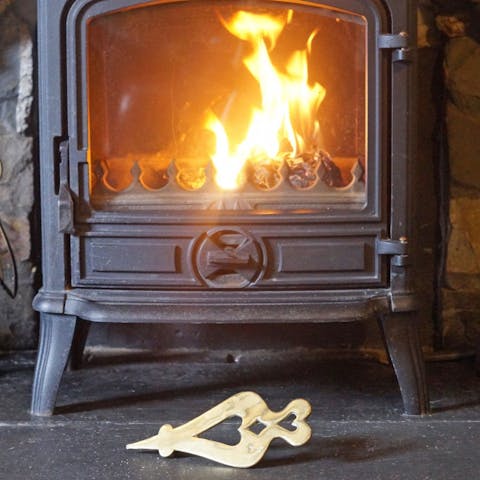 Curl up next to the wood-burning stove on chilly winter evenings