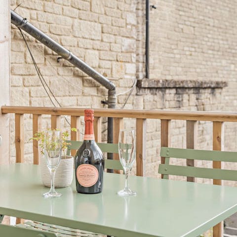 Raise a toast on the patio to your Cotswolds getaway
