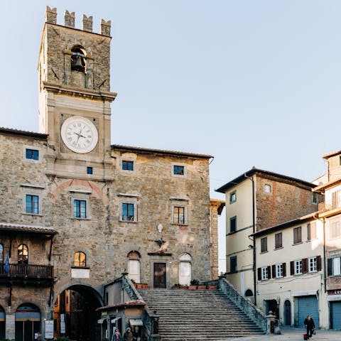 Admire the charming town of Cortona, a fifteen-minute drive away