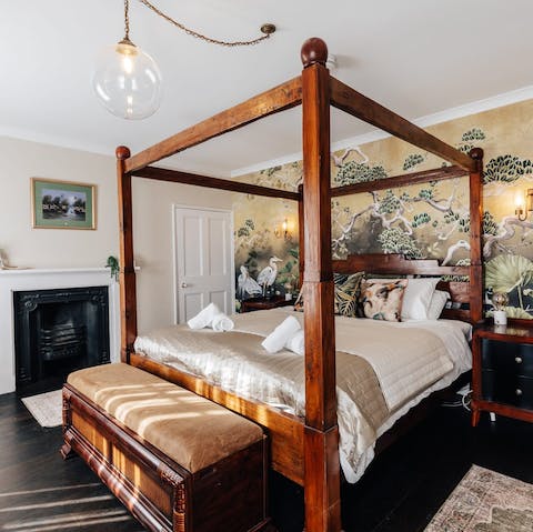 Enjoy a truly regal slumber in the four-poster bed