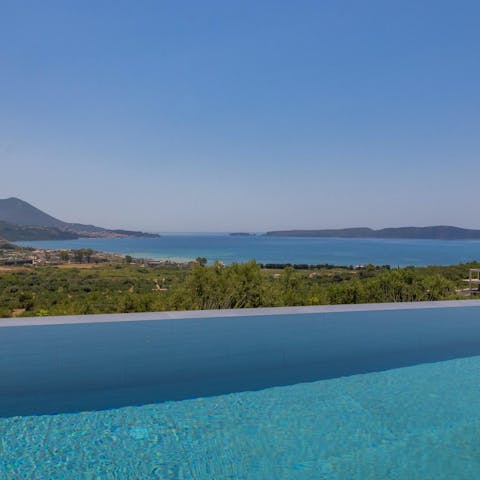 Swim laps to cool off and pause to gaze at the bay