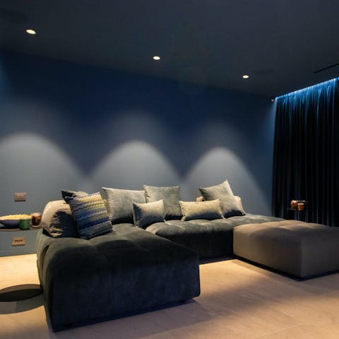 Cosy up for a film night in the dedicated cinema room