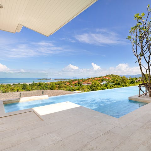 Bask in the stunning sea views from your sparkling infinity pool