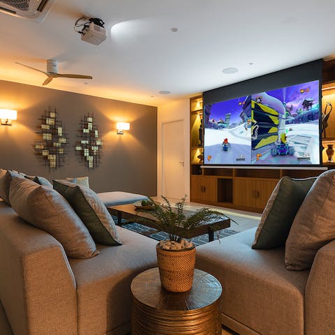 Sit back, relax, and enjoy a movie night in your cinema room